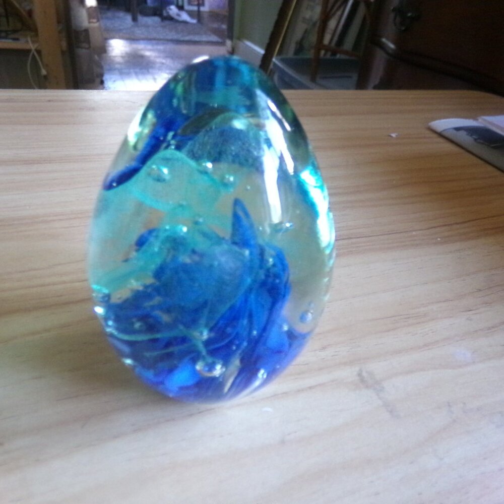 vintage heavy blown glass paper weight. signed.